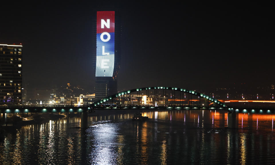 The word &#39;Nole&#39;, a nickname of Serbian tennis player Novak Djokovic and the colours of the Serbian flag are illuminated at the Belgrade Tower in Serbia on January 16, 2022.
