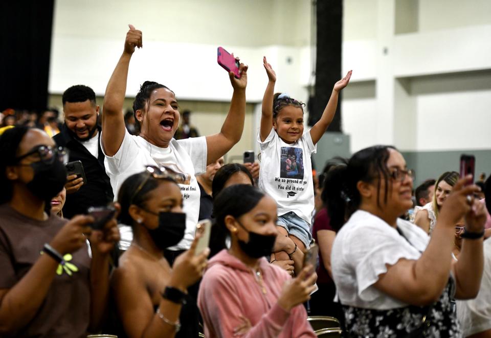 WORCESTER - Family members cheer as North High's graduates proceed to commencement at the DCU Center Wednesday, June 8, 2022.