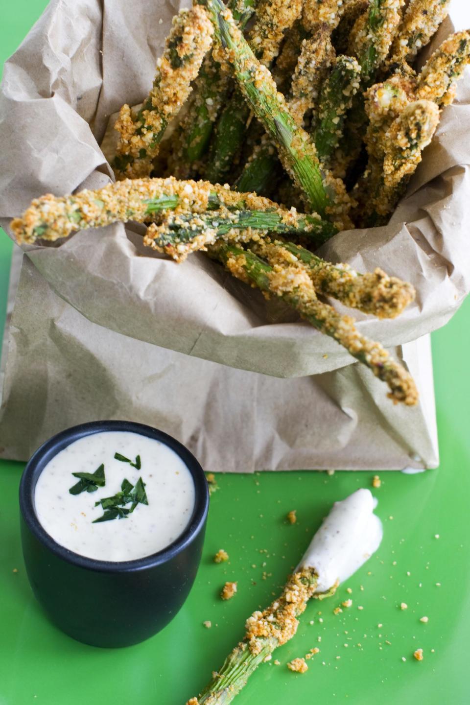 In this image taken on March 11, 2013, almond-crusted bake-fried asparagus is shown in Concord, N.H. (AP Photo/Matthew Mead)