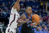 Kentucky's Dre'una Edwards (44) drives against South Carolina's Bree Hall (23) in the first half of the NCAA women's college basketball Southeastern Conference tournament championship game Sunday, March 6, 2022, in Nashville, Tenn. (AP Photo/Mark Humphrey)