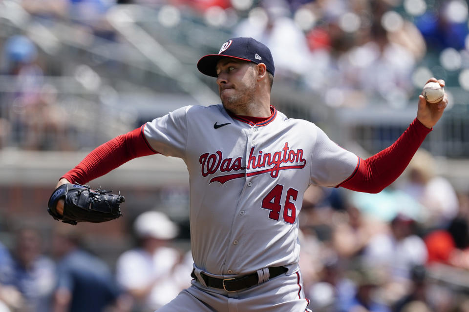 Washington Nationals starting pitcher Patrick Corbin (46) delivers to an Atlanta Braves batter in the first inning of a baseball game Thursday, June 3, 2021, in Atlanta. (AP Photo/John Bazemore)
