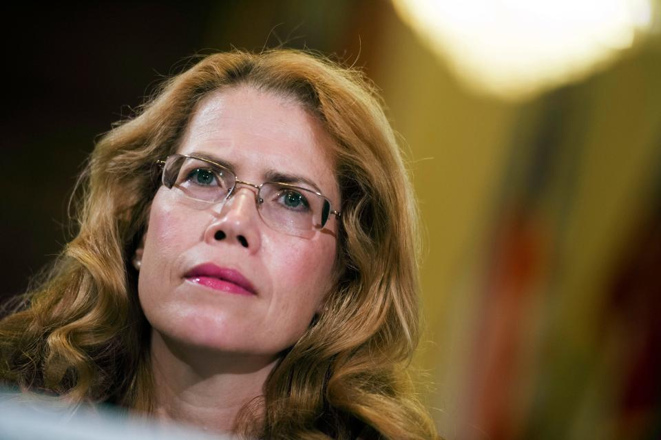 Physician Katherine Mitchell appears before a House Veterans' Affairs Committee hearing on July 8, 2014.