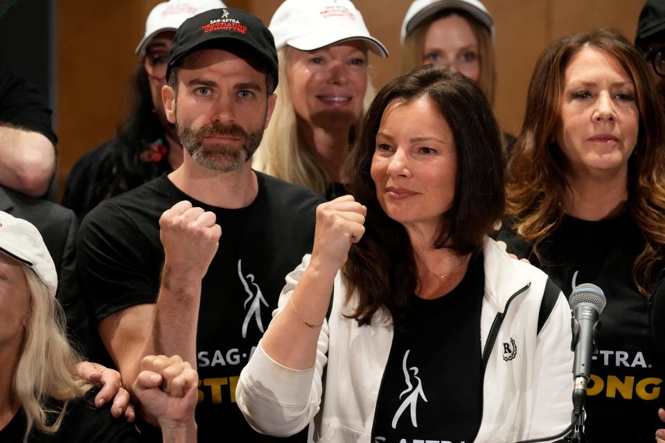 SAG-AFTRA president Fran Drescher with other members of the guild at a news conference announcing the first strike for film and TV actors since 1986.