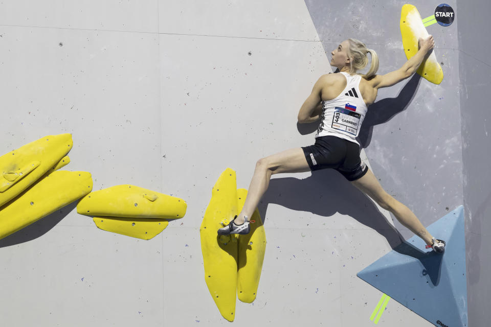 FILE - Slovenia's Janja Garnbret competes during the women's Boulder Final at the IFSC Climbing World Championship 2023 in Bern, Switzerland, Saturday, Aug. 5, 2023. Garnbret called for more discussion about eating disorders at the youth level of the sport, and for more action by officials, including banning unhealthy athletes from competing. (Anthony Anex/Keystone via AP, File)