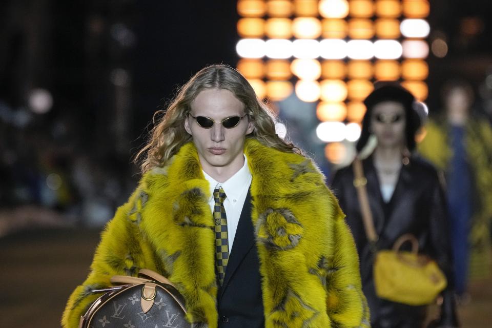 A model wears a creation for Louis Vuitton as part of the Menswear Spring/Summer 2024 fashion collection presented in Paris, Tuesday, June 20, 2023. (AP Photo/Christophe Ena)