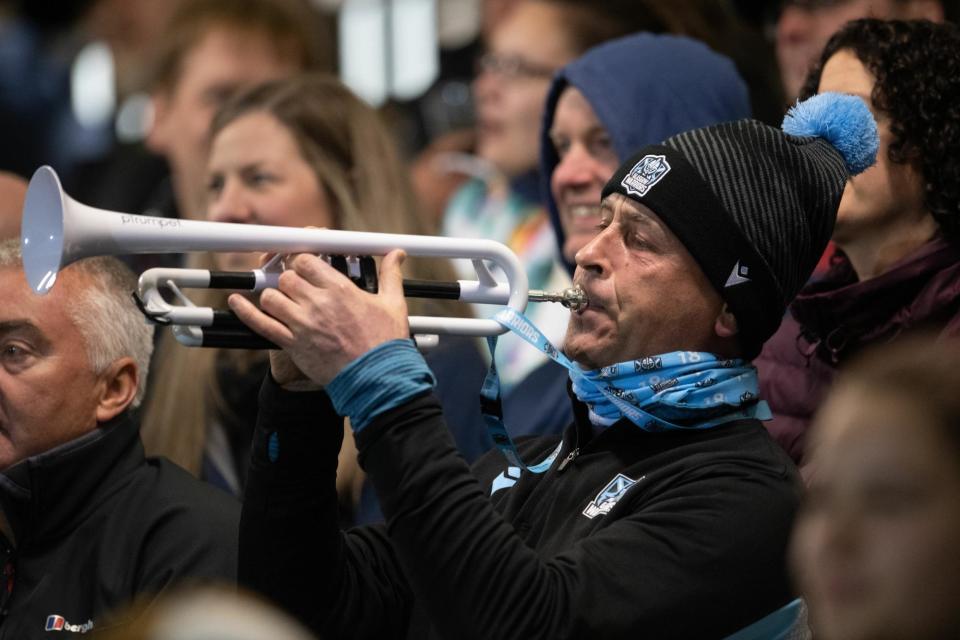 Ollie Smith's dad, Gavin, plays the trumpet during a Glasgow Warriors match at Scotstoun. (Photo by Ross Parker / SNS Group)