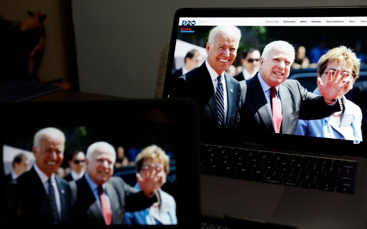 Former United States Senator John McCain and Democratic presidential nominee Joe Biden are displayed on a computer during the friendship video  - JASON SZENES/EPA-EFE/Shutterstock