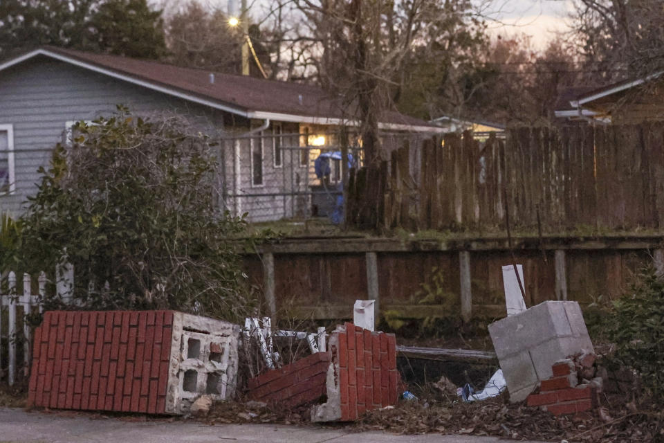 A broken barricade is seen around a retention pond in an area impacted by a local gerrymandering case in Jacksonville, Fla., Jan. 30, 2023. A protracted legal fight over how city council districts were drawn in Jacksonville, Florida, reflects an aspect of redistricting that often remains in the shadows. Political map-drawing for congressional and state legislative seats captures wide attention after new census numbers are released every 10 years. No less fierce are the battles over the way voting lines are drawn in local governments, for city councils, county commissions and even school boards. (AP Photo/Gary McCullough)