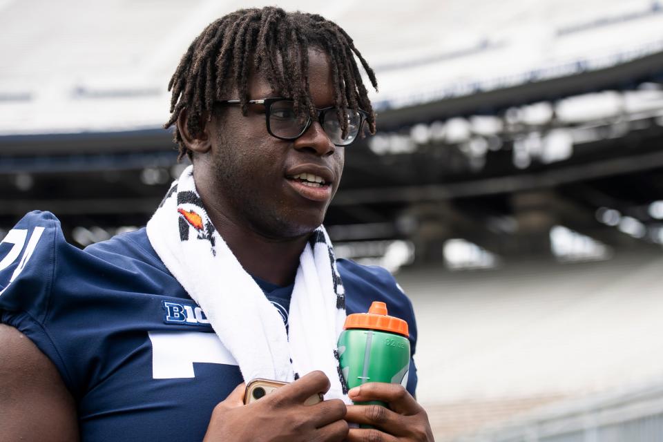 Penn State sophomore offensive lineman Olumuyiwa Fashanu talks with a reporter during football media day at Beaver Stadium on Saturday, August 6, 2022, in State College.<br>Hes Dr 080622 Psumedia