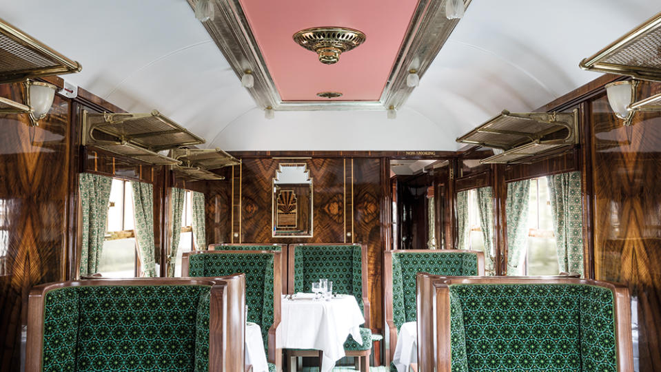 The carriage features handcrafted marquetry and custom textiles. - Credit: Photo: Courtesy of British Pullman, A Belmond Train, England