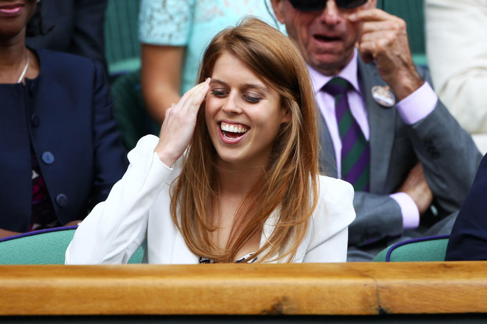 <p>Princess Beatrice makes a rare - but happy - appearance at the tournament in 2011. (Getty Images)</p> 