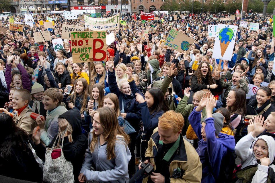 Protesters demonstrate in front of Cyprus' Parliament building in Nicosia, Cyprus, Friday, Sept. 20, 2019. Protesters around the world joined rallies on Friday as a day of worldwide demonstrations calling for action against climate change began ahead of a U.N. summit in New York. (Nils Meilvang/Ritzau Scanpix via AP)