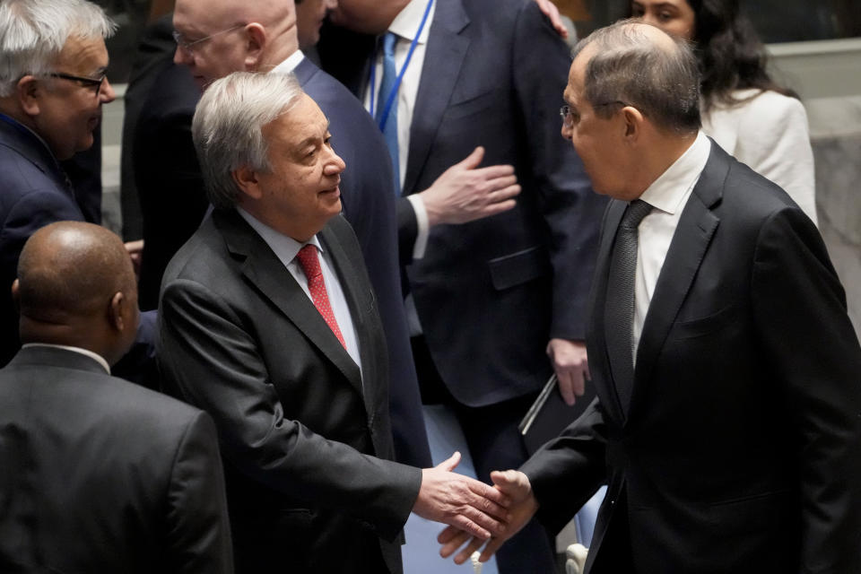 Antonio Guterres, United Nations Secretary General, left, and Russia's foreign minister Sergey Lavrov, serving as president of the council, right, shake hands before a meeting of the U.N. Security Council, Monday, April 24, 2023, at United Nations headquarters. (AP Photo/John Minchillo)