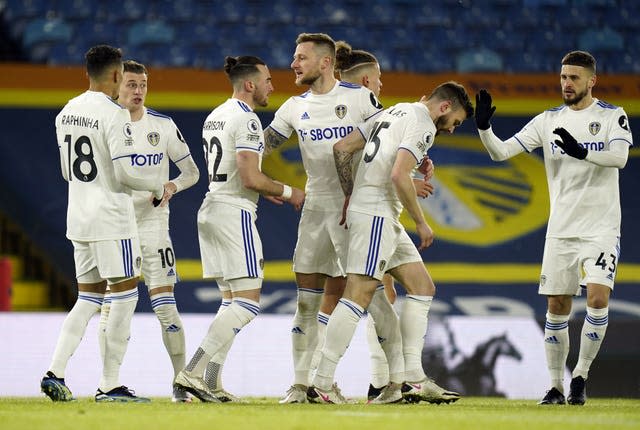 Jack Harrison (third left) opened the scoring 