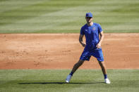 Chicago Cubs third baseman Kris Bryant warms up during baseball practice at Wrigley Field on Friday, July 3, 2020 in Chicago. (AP Photo/Kamil Krzaczynski)