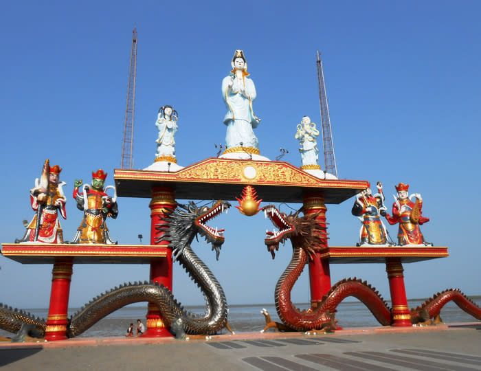 Dragon gate: Kenjeran complex is one of Surabaya's famous recreational area for the locals. One of the interesting buildings in the complex is the Sanggar Agung temple where they have large statue of goddess and dragons.