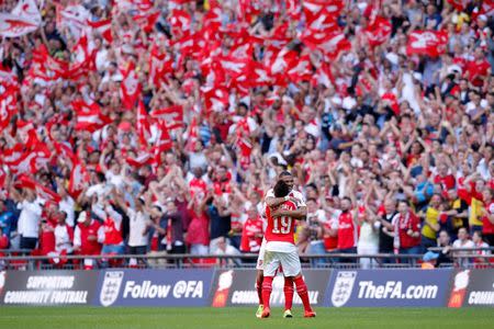 Football - Chelsea v Arsenal - FA Community Shield - Wembley Stadium - 2/8/15 Arsenal's Kieran Gibbs and Santi Cazorla celebrate at the end of the match Action Images via Reuters / Andrew Couldridge Livepic