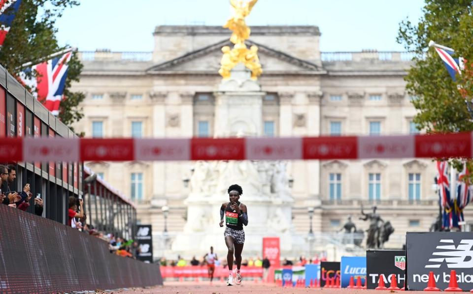 Joyciline Jepkosgei of Kenya heads down the mall on the way to winning the Women's Elite Race (Getty)