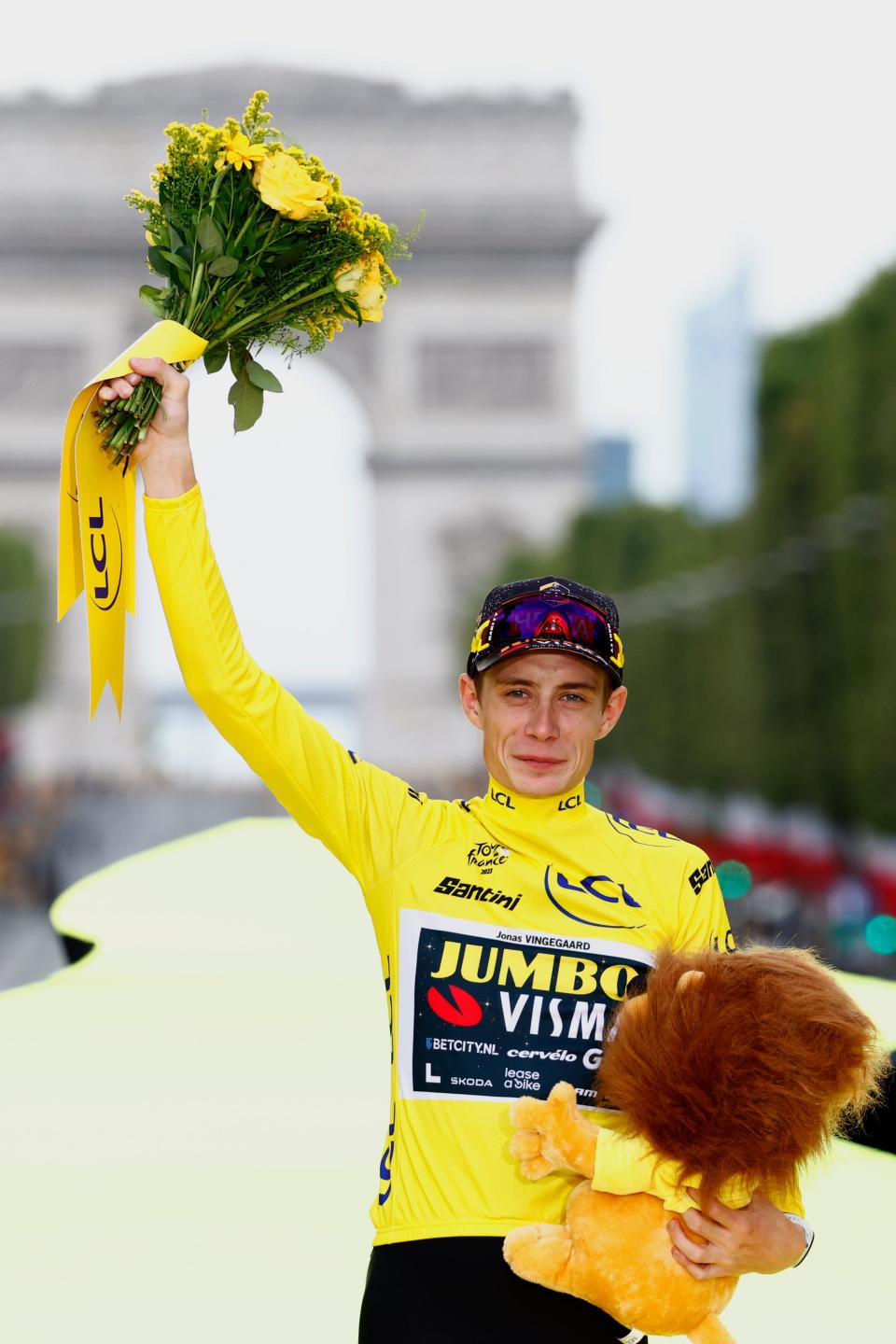 Denmark's Jonas Vingegaard celebrates after repeating as winner of the Tour de France on Sunday, July 23, 2023. (Etienne Garnier/Pool Photo via AP)