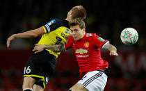 Soccer Football - Carabao Cup Third Round - Manchester United vs Burton Albion - Old Trafford, Manchester, Britain - September 20, 2017 Manchester United’s Victor Lindelof in action with Burton Albion's Luke Varney Action Images via Reuters/Jason Cairnduff