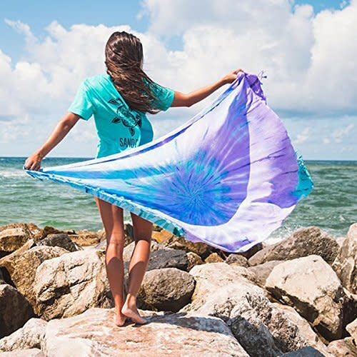 The Sand Cloud Luna Beach Towel uses a sand-resistant design to keep the beach at the beach — not with you when you leave. (Photo: Amazon) 