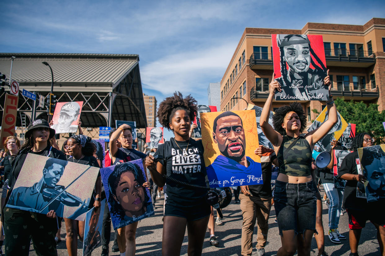 People gathered in downtown Minneapolis to celebrate the sentencing of former Minneapolis police officer Derek Chauvin, while also calling for continual police reform. Chauvin was sentenced to 22.5 years in prison after being convicted of murder in the death of George Floyd. (Brandon Bell/Getty Images)