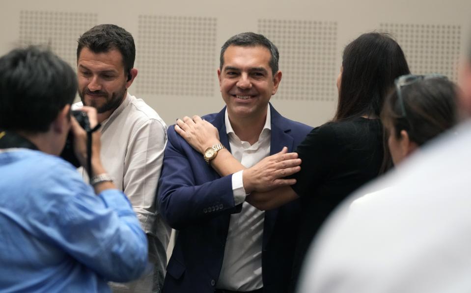 Opposition leader Alexis Tsipras, head of the left-wing Syriza party leaves after his statements at Zappeio Conference Hall in Athens, Greece, Thursday, June 29, 2023. Tsipras has announced his decision to step down after a crushing election defeat. The 48 year-old politician served as Greece's prime minister from 2015 to 2019 during politically tumultuous years as the country struggled to remain in the euro zone and end a series of international bailouts. (AP Photo/Petros Giannakouris)