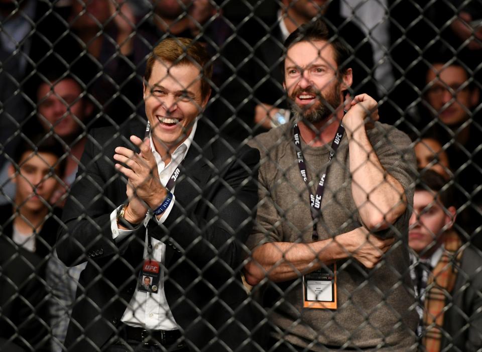 <p>Actor Hugh Jackman (R) watches as Stephen Thompson and Tyron Woodley fight in their welterweight championship bout during the UFC 205 event at Madison Square Garden on November 12, 2016 in New York City. (Photo by Jeff Bottari/Zuffa LLC/Zuffa LLC via Getty Images) </p>