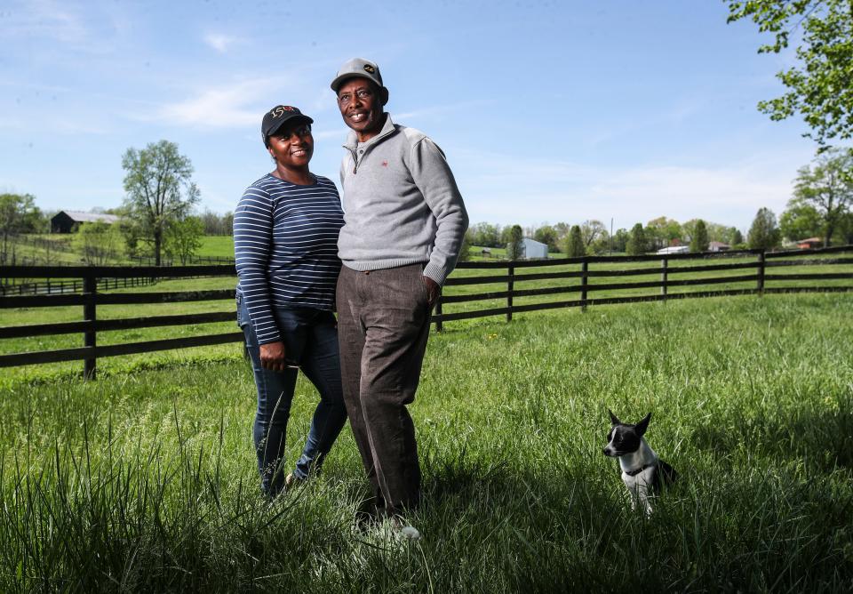 Trainer Larry Demeritte with his wife Inga and their dog Jojo at their farm outside Midway, Ky. The Bahamas native has battled cancer during his career. He now has West Saratoga, a 2024 Kentucky Derby entry; his first horse ever in the Run for the Roses.