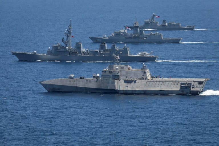 The USS Mobile, JS Akebono, HMAS Warramunga and BRP Antonio Luna sail in formation during military drills involving the US, Japan, Australia and the Philippines (Leo BAUMGARTNER)