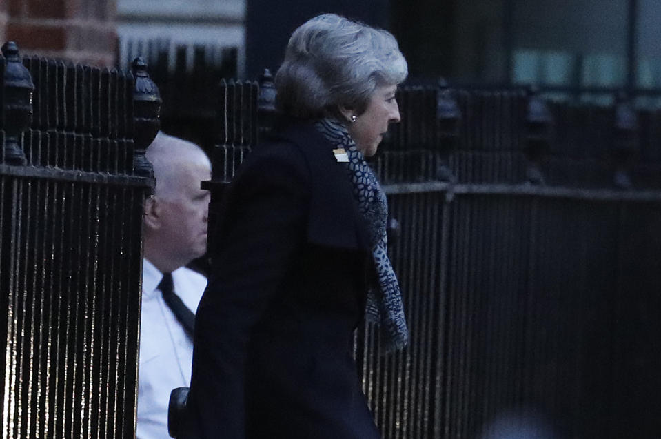 Britain's Prime Minister Theresa May leaves 10 Downing Street, in London, Thursday, Feb. 7, 2019, travelling to join an EU meeting in Brussels. Theresa May plans to meet with European leaders in Brussels on Thursday seeking changes to the so called Irish backstop, before Britain leaves the EU on upcoming March 29. (AP Photo/Frank Augstein)