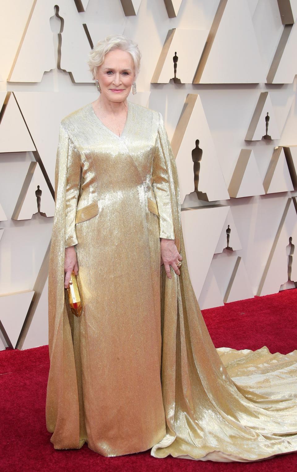 Glenn Close wears a gold gown featuring a cape at the 91st Annual Academy Awards. (Photo: Dan MacMedan/Getty Images)