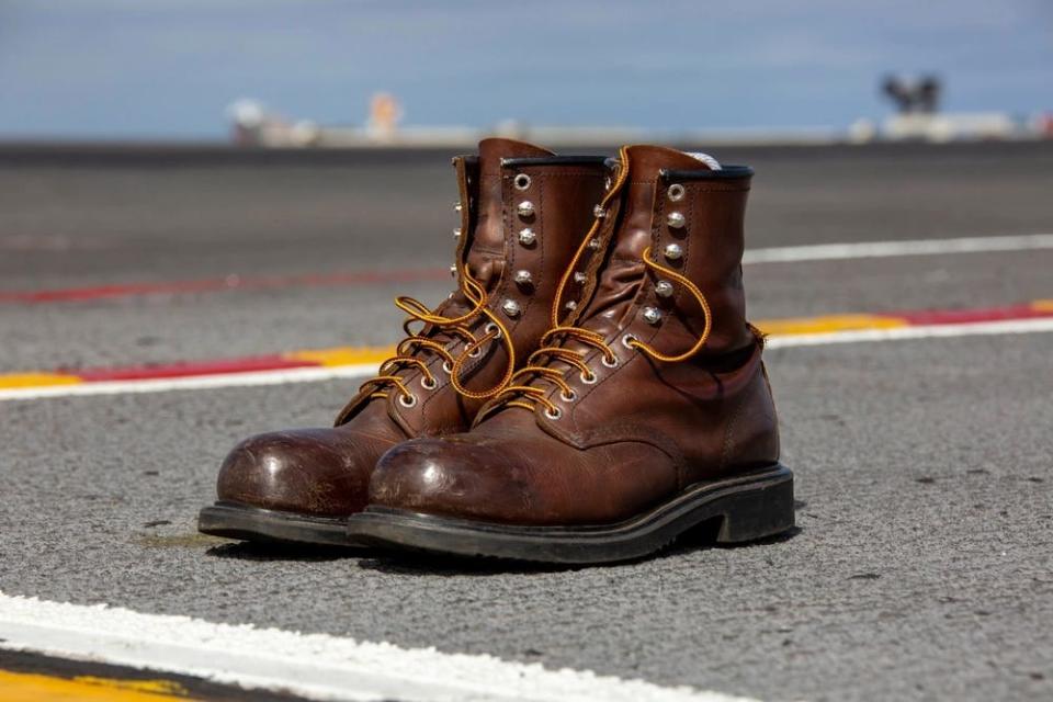 A pair of boots prepare on a carrier flight deck