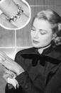 <p>Prince Rainier III of Monaco originally proposed to actress Grace Kelly with a simple eternity band of rubies and diamonds from Cartier. However, after seeing some of the leading ladies of Hollywood flashing much bigger rings, he quickly ordered a 10.5 carat emerald-cut diamond flanked by two baguettes, also from Cartier.</p>