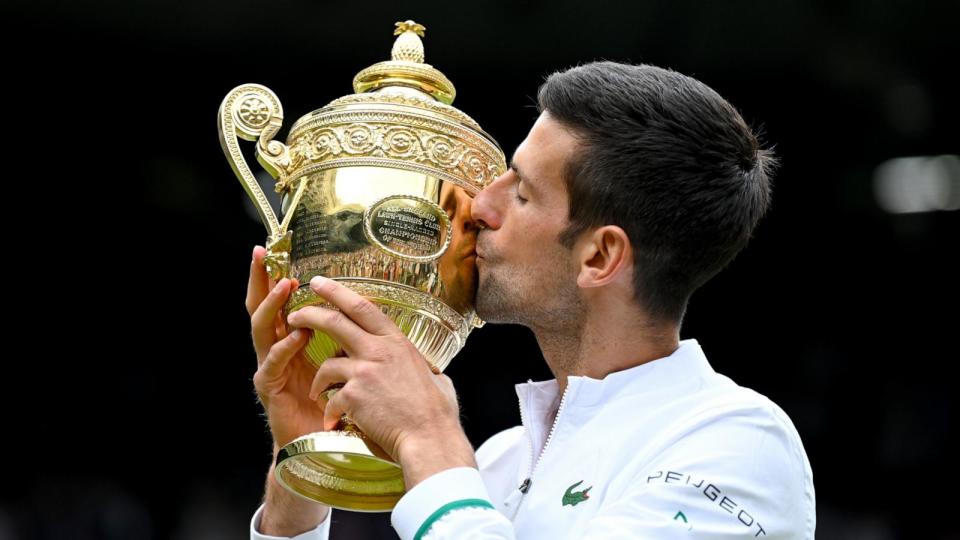 PHOTO: Novak Djokovic holds the trophy after winning his sixth Wimbledon Men's Single Final at Wimbledon Championships Tennis Tournament at All England Lawn Tennis and Croquet Club on July 11, 2021 in London. (Karwai Tang/WireImage via Getty Images, FILE)