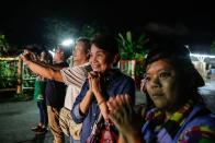 <p>Crowds gather in Chiangrai, Thailand as Thai Navy SEALs rescue the boys soccer team and their coach from a collapsed cave.</p>