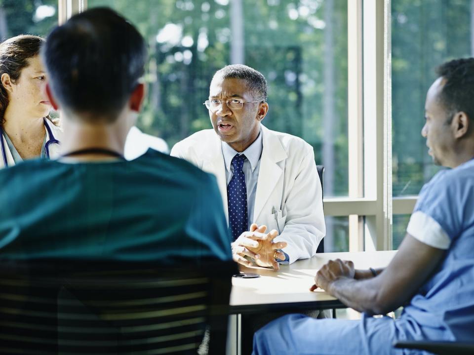 Opening guideline committees to nonacademic or specialty society health care providers could bring new perspectives to guideline creation. <a href="https://www.gettyimages.com/detail/photo/mature-male-doctor-leading-medical-team-meeting-royalty-free-image/529400761" rel="nofollow noopener" target="_blank" data-ylk="slk:Thomas Barwick/Stone via Getty Images;elm:context_link;itc:0;sec:content-canvas" class="link ">Thomas Barwick/Stone via Getty Images</a>