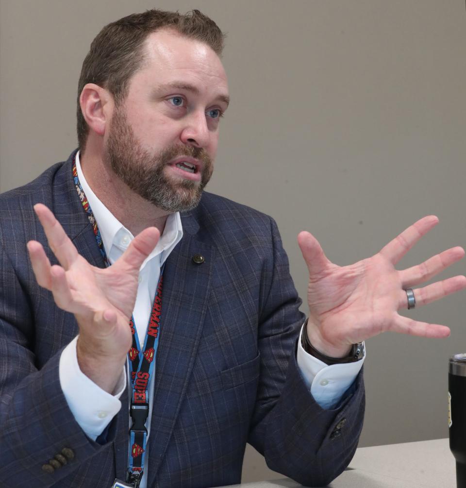 Dr. Nathan Heinzerling, pediatric surgeon and trauma medical director at Akron Children's Hospital, explains the injuries to Tyren Thompson, 7, who was shot after a pee wee football game.