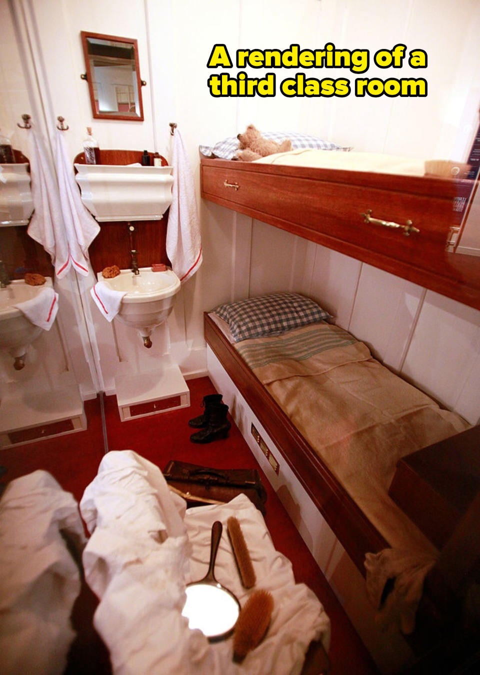 two twin bunkbeds to the right and two standing sinks on the wall perpendicular