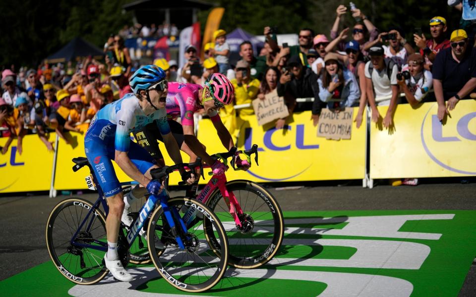 Magnus Cort and Nick Schultz (foreground) - tour de france 2022 stage 11 live updates results galibier - AP