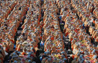 More than two thousand housewives make Kimchi for donation to the poor in preparation for winter in front of City Hall on November 15, 2012 in Seoul, South Korea. Kimchi is a traditional Korean dish of fermented vegetables usually mixed with chili and eaten with rice or served as a side dish to a main meal. (Photo by Chung Sung-Jun/Getty Images)