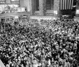 Grand Central Terminal packed with Fourth of July holiday travelers lined up at ticket windows, July 2, 1949. (NY Daily News Archive via Getty Images)