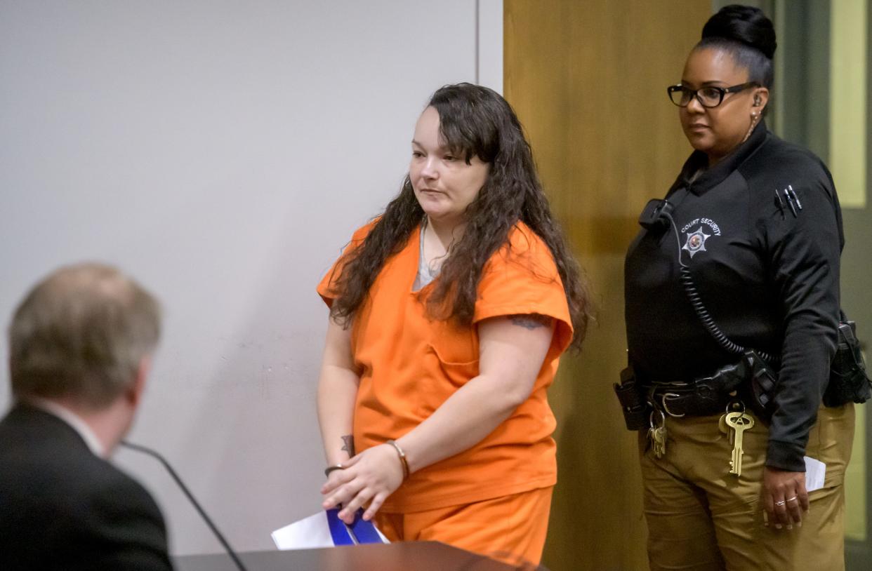Stephanie Jones, mother of Navin Jones, enters the courtroom for her sentencing hearing Thursday, April 25, 2024 at the Peoria County Courthouse. Judge John Vespa sentenced her to 100 years in prison for the starvation death of the 8-year-old boy in 2022.