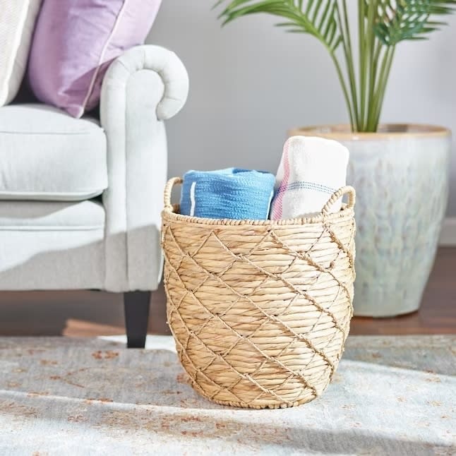 woven basket with blankets inside