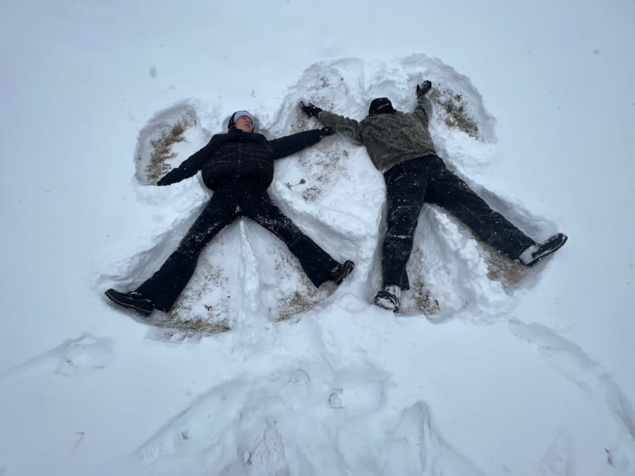 Adults like playing in the snow, too, as proven by Ethan Allen and Niah Clark in Franklin (Courtesy: Ethan Allen)