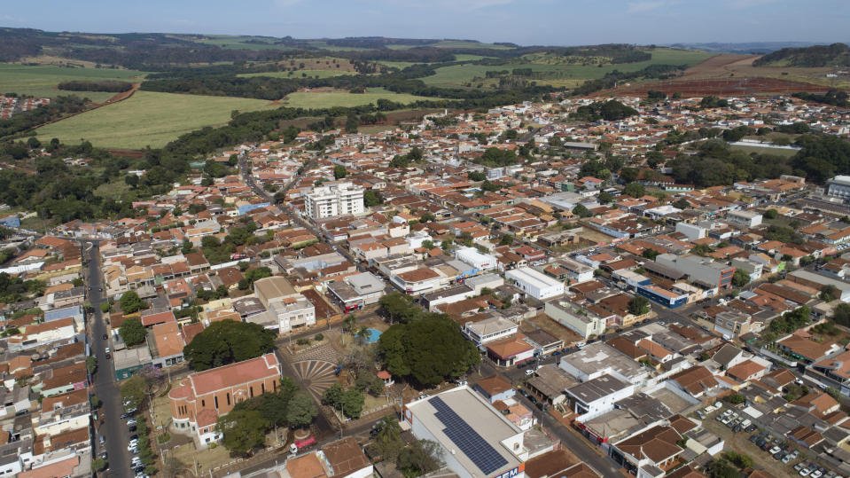 An aerial view of Serrana, Sao Paulo state, Brazil, Friday, May 28, 2021. Brazil's Butantan Institute has finished a mass vaccination of the city's entire adult population with doses of Sinovac, to test the new coronavirus' behavior in response to the vaccine. (AP Photo/Andre Penner)