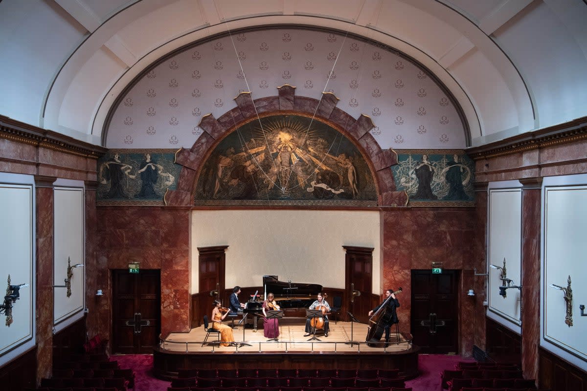 Musicians of the Kaleidoscope Chamber Collective rehearse at Wigmore Hall (PA)