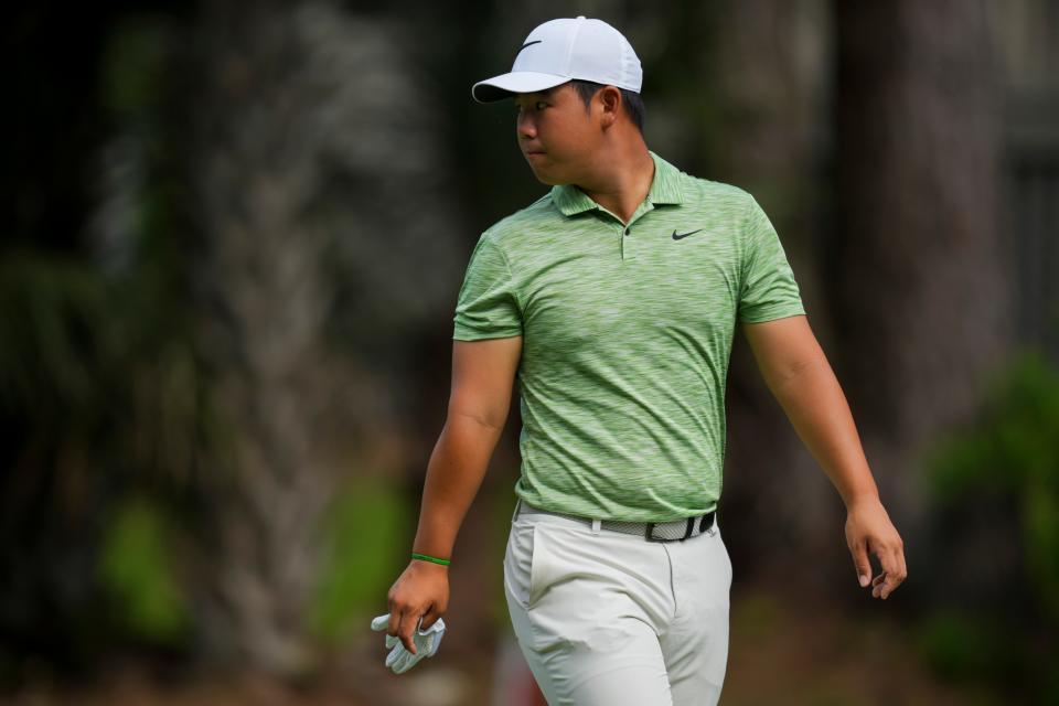 Apr 20, 2024; Hilton Head, South Carolina, USA; Tom Kim walks on the 14th green during the third round of the RBC Heritage golf tournament. Mandatory Credit: Aaron Doster-USA TODAY Sports