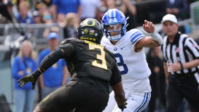 BYU quarterback Jaren Hall runs against Oregon Ducks at Autzen Stadium in Eugene on Saturday, Sept. 17, 2022.