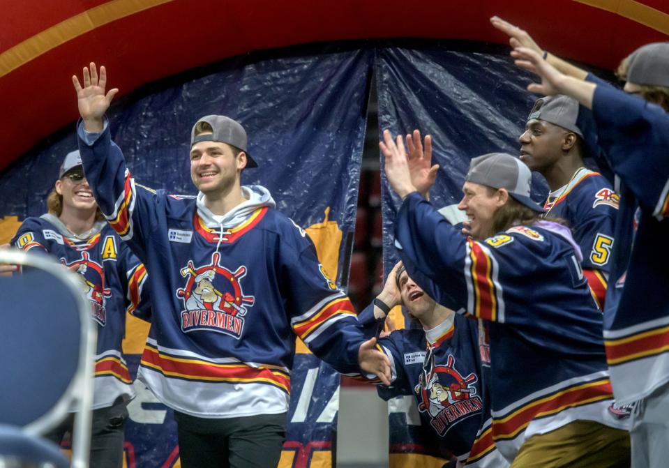 Peoria Rivermen forward Alec Baer, the reigning SPHL Most Valuable Player, makes his entrance to the cheers of fans and his teammates during a celebration of the team's SPHL championship Friday, May 6, 2022 at the Peoria Civic Center.